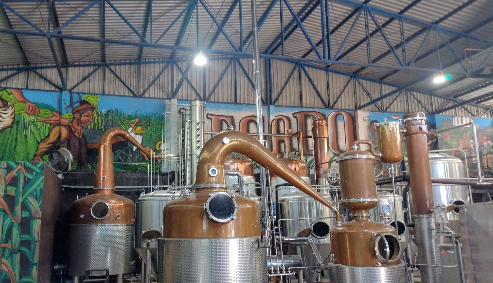 Copper pot stills and stainless columns at Legado Distillery